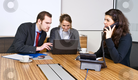 To use this stock image in your creative project, please select the size you need over to the right and click the "Add to Cart" button.
Your downloaded image will come with the Cutcaster watermark removed so don’t worry about the watermark you see on this page. Small Business team stock photo, A small business team in a cubicle conference room during a meeting by Corepics VOF