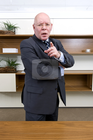 To use this stock image in your creative project, please select the size you need over to the right and click the "Add to Cart" button.
Your downloaded image will come with the Cutcaster watermark removed so don’t worry about the watermark you see on this page. Warning finger stock photo, A senior manager lifting his index finger, issueing a warning by Corepics VOF