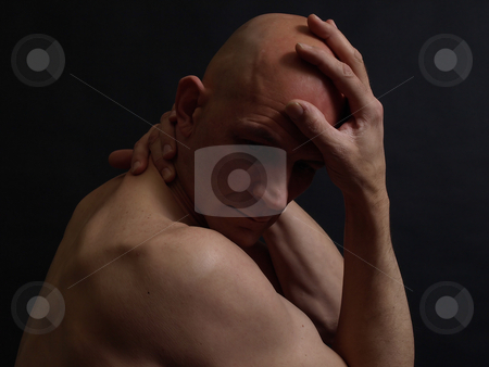 To use this stock image in your creative project, please select the size you need over to the right and click the "Add to Cart" button.
Your downloaded image will come with the Cutcaster watermark removed so don’t worry about the watermark you see on this page. In the Dark stock photo, A nude bald male in the shadows over a black background. by Robert Gebbie