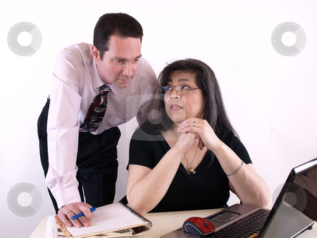 To use this stock image in your creative project, please select the size you need over to the right and click the "Add to Cart" button.
Your downloaded image will come with the Cutcaster watermark removed so don’t worry about the watermark you see on this page. Business Couple at Computer stock photo, A male and female working together in the office at the computer. Isolated against a white background. by Robert Gebbie