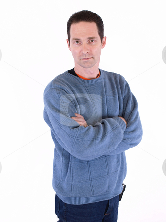 To use this stock image in your creative project, please select the size you need over to the right and click the "Add to Cart" button.
Your downloaded image will come with the Cutcaster watermark removed so don’t worry about the watermark you see on this page. Crossed Arms stock photo, A man in a blue sweater folding his arms, isolated on a white background. by Robert Gebbie