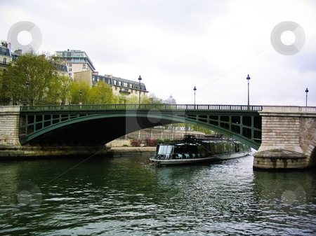 To use this stock image in your creative project, please select the size you need over to the right and click the "Add to Cart" button.
Your downloaded image will come with the Cutcaster watermark removed so don’t worry about the watermark you see on this page. River Seine stock photo, Seine tour boat going under a bridge by Jaime Pharr