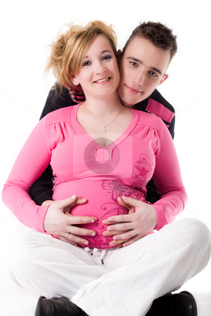 To use this stock image in your creative project, please select the size you need over to the right and click the "Add to Cart" button.
Your downloaded image will come with the Cutcaster watermark removed so don’t worry about the watermark you see on this page. We are pregnant stock photo, Young lovely caucasian couple expecting their baby by Frenk and Danielle Kaufmann
