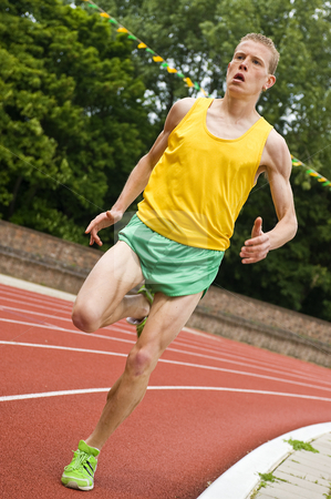 To use this stock image in your creative project, please select the size you need over to the right and click the "Add to Cart" button.
Your downloaded image will come with the Cutcaster watermark removed so don’t worry about the watermark you see on this page. Running stock photo, Athlete running a middle distance race on an oval track by Corepics VOF