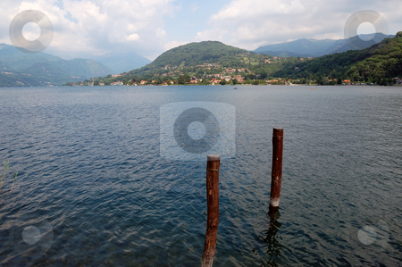 To use this stock image in your creative project, please select the size you need over to the right and click the "Add to Cart" button.
Your downloaded image will come with the Cutcaster watermark removed so don’t worry about the watermark you see on this page. Lake scenery stock photo, Lake Scenery (Orta Lake, Italy) by ALESSANDRO TERMIGNONE