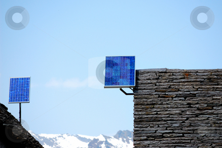 To use this stock image in your creative project, please select the size you need over to the right and click the "Add to Cart" button.
Your downloaded image will come with the Cutcaster watermark removed so don’t worry about the watermark you see on this page. Solar panels stock photo, Solar panels on mountain houses roof by ALESSANDRO TERMIGNONE