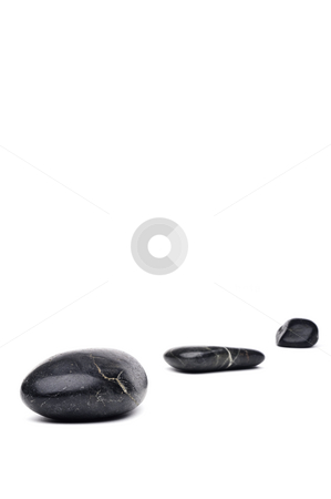 To use this stock image in your creative project, please select the size you need over to the right and click the "Add to Cart" button.
Your downloaded image will come with the Cutcaster watermark removed so don’t worry about the watermark you see on this page. A vertical image of 3 river rocks arranged in a line with space stock photo, A vertical image of 3 river rocks arranged in a line with space for copy by Vince Clements