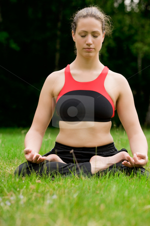 To use this stock image in your creative project, please select the size you need over to the right and click the "Add to Cart" button.
Your downloaded image will come with the Cutcaster watermark removed so don’t worry about the watermark you see on this page. Practising yoga in a green field with trees stock photo, Young adult woman practising yoga on a field surrounded by trees by Frenk and Danielle Kaufmann
