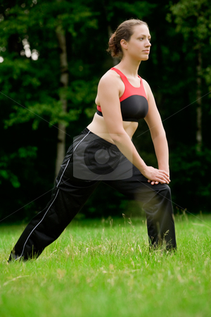 To use this stock image in your creative project, please select the size you need over to the right and click the "Add to Cart" button.
Your downloaded image will come with the Cutcaster watermark removed so don’t worry about the watermark you see on this page. Practising yoga in a green field with trees stock photo, Young adult woman practising yoga on a field surrounded by trees by Frenk and Danielle Kaufmann