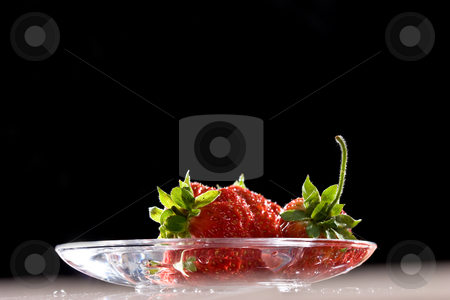 To use this stock image in your creative project, please select the size you need over to the right and click the "Add to Cart" button.
Your downloaded image will come with the Cutcaster watermark removed so don’t worry about the watermark you see on this page. Strawberry stock photo, Food series: fresh ripe red strawberry on the plate by Gennady Kravetsky