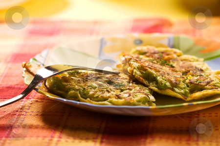 To use this stock image in your creative project, please select the size you need over to the right and click the "Add to Cart" button.
Your downloaded image will come with the Cutcaster watermark removed so don’t worry about the watermark you see on this page. Pancake stock photo, Food serias: cabbage pancake on the plate by Gennady Kravetsky