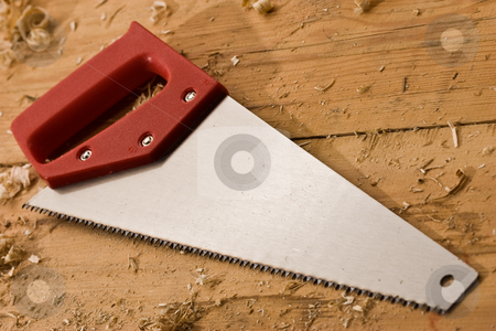 To use this stock image in your creative project, please select the size you need over to the right and click the "Add to Cart" button.
Your downloaded image will come with the Cutcaster watermark removed so don’t worry about the watermark you see on this page. Saw stock photo, Tools series: saw with red plastic handle by Gennady Kravetsky