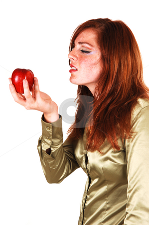To use this stock image in your creative project, please select the size you need over to the right and click the "Add to Cart" button.
Your downloaded image will come with the Cutcaster watermark removed so don’t worry about the watermark you see on this page. This apple is good. stock photo, Girl with red apple, long bright red hair in a close-up shoot and can not
wait to eat the apple. by Horst Petzold