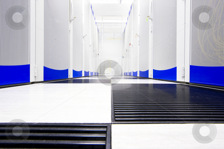 To use this stock image in your creative project, please select the size you need over to the right and click the "Add to Cart" button.
Your downloaded image will come with the Cutcaster watermark removed so don’t worry about the watermark you see on this page. Data center suite stock photo, Clean suite in a data center with the perforated doors of server racks by Corepics VOF