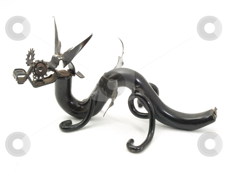 To use this stock image in your creative project, please select the size you need over to the right and click the "Add to Cart" button.
Your downloaded image will come with the Cutcaster watermark removed so don’t worry about the watermark you see on this page. Metal Serpent Dragon stock photo, A metal sculpture of a serpent style dragon. Isolated over white. Photographer holds copyright for sculpture. by Robert Gebbie