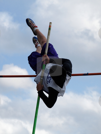 To use this stock image in your creative project, please select the size you need over to the right and click the "Add to Cart" button.
Your downloaded image will come with the Cutcaster watermark removed so don’t worry about the watermark you see on this page. Pole Vaulter stock photo, Local Track and Field Event between rivals Columbia River High School and visiting team Hudson?? by Robert Gebbie
