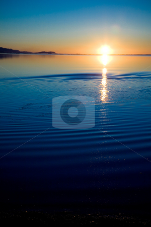 To use this stock image in your creative project, please select the size you need over to the right and click the "Add to Cart" button.
Your downloaded image will come with the Cutcaster watermark removed so don’t worry about the watermark you see on this page. Pacific Northwest Sunset stock photo, Sunset at Cline Spit in Sequim Washington. by Travis Manley