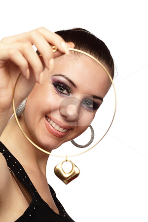 To use this stock image in your creative project, please select the size you need over to the right and click the "Add to Cart" button.
Your downloaded image will come with the Cutcaster watermark removed so don’t worry about the watermark you see on this page. Happy girl with golden heart shaped necklace in her hand stock photo, Happy girl with golden heart shaped necklace in her hand over white by Ivelin Radkov