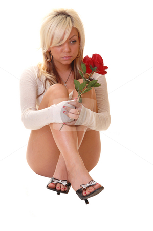 To use this stock image in your creative project, please select the size you need over to the right and click the "Add to Cart" button.
Your downloaded image will come with the Cutcaster watermark removed so don’t worry about the watermark you see on this page. Woman sitting on floor. stock photo, Young woman in panties and high heels sitting on the floor in the studio
holding a red rose in her hand, for white background. by Horst Petzold