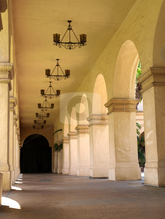 To use this stock image in your creative project, please select the size you need over to the right and click the "Add to Cart" button.
Your downloaded image will come with the Cutcaster watermark removed so don’t worry about the watermark you see on this page. Arched mission walkway stock photo, An exterior mission style walkway with arched design by Jill Reid