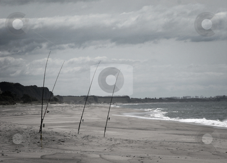 To use this stock image in your creative project, please select the size you need over to the right and click the "Add to Cart" button.
Your downloaded image will come with the Cutcaster watermark removed so don’t worry about the watermark you see on this page. Fishing rods on beach stock photo, Fishing rods standing on windy, lonely beach by David Schmidt