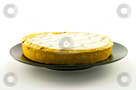 To use this stock image in your creative project, please select the size you need over to the right and click the "Add to Cart" button.
Your downloaded image will come with the Cutcaster watermark removed so don’t worry about the watermark you see on this page. Bakewell Tart stock photo, Delicious looking iced bakewell tart on a black plate with a plain background by Keith Wilson