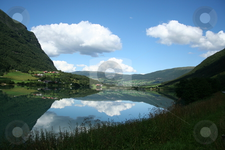 To use this stock image in your creative project, please select the size you need over to the right and click the "Add to Cart" button.
Your downloaded image will come with the Cutcaster watermark removed so don’t worry about the watermark you see on this page. Lake stock photo, by Stelian Ion