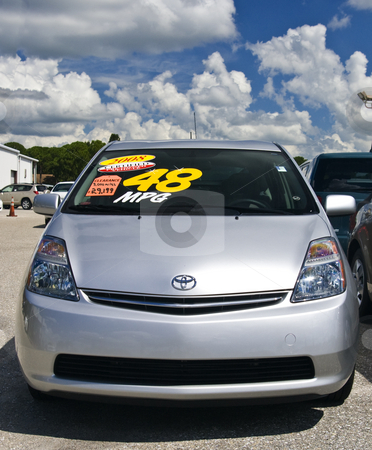 To use this stock image in your creative project, please select the size you need over to the right and click the "Add to Cart" button.
Your downloaded image will come with the Cutcaster watermark removed so don’t worry about the watermark you see on this page. Used Toyota Prius stock photo, Toyota dealer sells used 2008 Prius for more than it costs new. by Steve Carroll