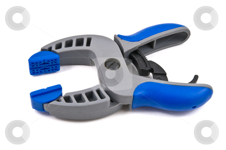 To use this stock image in your creative project, please select the size you need over to the right and click the "Add to Cart" button.
Your downloaded image will come with the Cutcaster watermark removed so don’t worry about the watermark you see on this page. Clamp stock photo, A plastic spring clamp, such as used in woodworking. by Steve Carroll