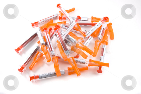 To use this stock image in your creative project, please select the size you need over to the right and click the "Add to Cart" button.
Your downloaded image will come with the Cutcaster watermark removed so don’t worry about the watermark you see on this page. Medical disposable syringes stock photo, A stack of expended syringes awaiting disposal, on white background by Steve Carroll