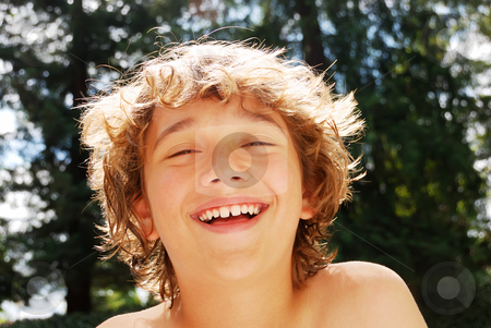 To use this stock image in your creative project, please select the size you need over to the right and click the "Add to Cart" button.
Your downloaded image will come with the Cutcaster watermark removed so don’t worry about the watermark you see on this page. Teen Boy Enjoying Summer stock photo, Smiling teen boy enjoying summer against blurry tree and sky background. by Denis Radovanovic