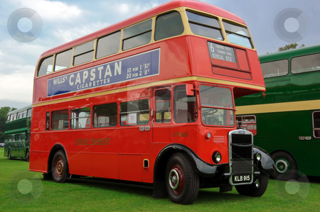To use this stock image in your creative project, please select the size you need over to the right and click the "Add to Cart" button.
Your downloaded image will come with the Cutcaster watermark removed so don’t worry about the watermark you see on this page. Half Cab Double Decker Bus stock photo, London Transport half cab restored bus at Alton bus rally by Robert Ford