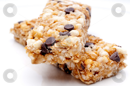 To use this stock image in your creative project, please select the size you need over to the right and click the "Add to Cart" button.
Your downloaded image will come with the Cutcaster watermark removed so don’t worry about the watermark you see on this page. A horizontal close up of two granola bars on a white plate stock photo, A horizontal close up of two granola bars on a white plate by Vince Clements