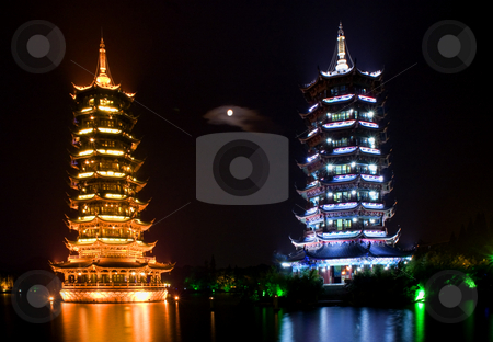 To use this stock image in your creative project, please select the size you need over to the right and click the "Add to Cart" button.
Your downloaded image will come with the Cutcaster watermark removed so don’t worry about the watermark you see on this page. Silver and Gold Pagodas Guilin China with Moon stock photo, Silver, Moon, and Gold, Sun, Pagodas with Moon Guilin, Guangxi Province, China by William Perry