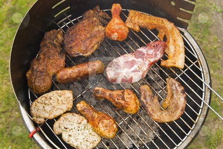 To use this stock image in your creative project, please select the size you need over to the right and click the "Add to Cart" button.
Your downloaded image will come with the Cutcaster watermark removed so don’t worry about the watermark you see on this page. Sausages, beef and other meat on a barbecue stock photo, Sausages, beef and other meat on a barbecue by Gert-Jan Kappert