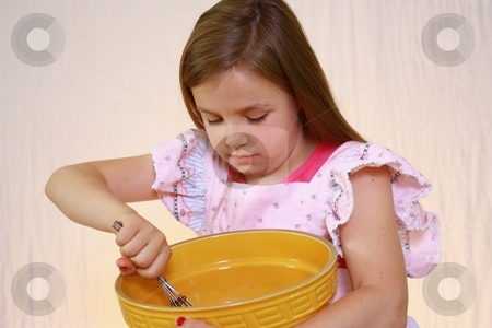 To use this stock image in your creative project, please select the size you need over to the right and click the "Add to Cart" button.
Your downloaded image will come with the Cutcaster watermark removed so don’t worry about the watermark you see on this page. Young cute girl with pink apron and mixing bowl. stock photo, Young girl with mixing bowl by Gregory Dean