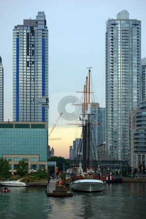 To use this stock image in your creative project, please select the size you need over to the right and click the "Add to Cart" button.
Your downloaded image will come with the Cutcaster watermark removed so don’t worry about the watermark you see on this page. Toronto skyline stock photo, Toronto skyline and sailing vessel from Ontario lake by Pavel Cheiko