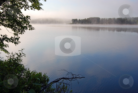 To use this stock image in your creative project, please select the size you need over to the right and click the "Add to Cart" button.
Your downloaded image will come with the Cutcaster watermark removed so don’t worry about the watermark you see on this page. Fog stock photo, Strong fog above lake in the morning by Pavel Cheiko