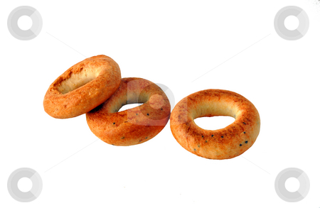 To use this stock image in your creative project, please select the size you need over to the right and click the "Add to Cart" button.
Your downloaded image will come with the Cutcaster watermark removed so don’t worry about the watermark you see on this page. Bakery stock photo, Isolated ring-shaped cracknel by Pavel Cheiko