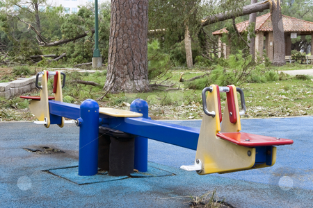 To use this stock image in your creative project, please select the size you need over to the right and click the "Add to Cart" button.
Your downloaded image will come with the Cutcaster watermark removed so don’t worry about the watermark you see on this page. Seesaw stock photo, A old seesaw at a old playground by Kevin Tietz