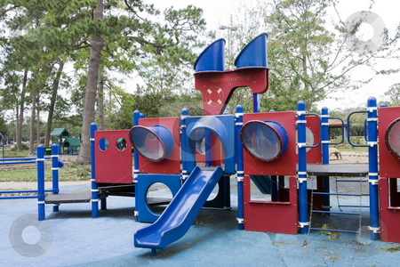 To use this stock image in your creative project, please select the size you need over to the right and click the "Add to Cart" button.
Your downloaded image will come with the Cutcaster watermark removed so don’t worry about the watermark you see on this page. Playground stock photo, A playground with slides shaped into a boat by Kevin Tietz