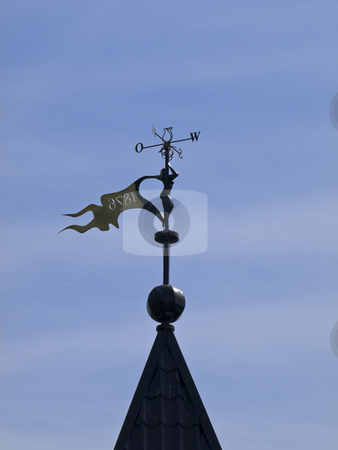 To use this stock image in your creative project, please select the size you need over to the right and click the "Add to Cart" button.
Your downloaded image will come with the Cutcaster watermark removed so don’t worry about the watermark you see on this page. Weather vane stock photo, Metallic weather vane against the blue sky by Sergej Razvodovskij