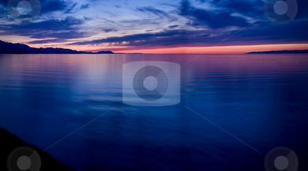 To use this stock image in your creative project, please select the size you need over to the right and click the "Add to Cart" button.
Your downloaded image will come with the Cutcaster watermark removed so don’t worry about the watermark you see on this page. Strait of Juan de Fuca Sunset stock photo, A beautiful sunset over the Strait of Juan de Fuca in Sequim. Panoramic photo. by Travis Manley