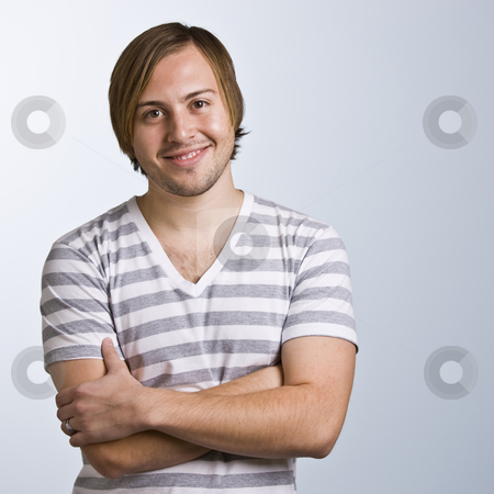 To use this stock image in your creative project, please select the size you need over to the right and click the "Add to Cart" button.
Your downloaded image will come with the Cutcaster watermark removed so don’t worry about the watermark you see on this page. Attractive brunette male stock photo, Beautiful brunette male, facing camera smiling with a short sleeved shirt. His arms are folded and he is looking at the camera. vertical by Jonathan Ross