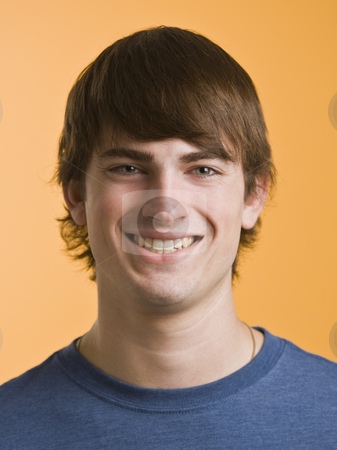 To use this stock image in your creative project, please select the size you need over to the right and click the "Add to Cart" button.
Your downloaded image will come with the Cutcaster watermark removed so don’t worry about the watermark you see on this page. Brunette male smiling stock photo, Headshot of cute brown haired man facing the camera. vertical by Jonathan Ross