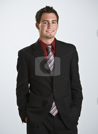 To use this stock image in your creative project, please select the size you need over to the right and click the "Add to Cart" button.
Your downloaded image will come with the Cutcaster watermark removed so don’t worry about the watermark you see on this page. Attractive male looking at the camera stock photo, Attractive male looking at the camera, smiling. 3/4 body shot frontal view. Vertical by Jonathan Ross