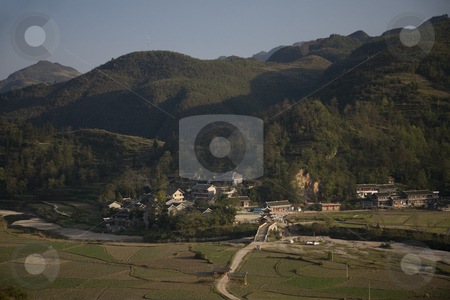 To use this stock image in your creative project, please select the size you need over to the right and click the "Add to Cart" button.
Your downloaded image will come with the Cutcaster watermark removed so don’t worry about the watermark you see on this page. Rural Chinese Village Guizhou China stock photo, Rural Chinese Village and Fields, Guizhiou Province, China by William Perry