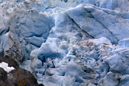 To use this stock image in your creative project, please select the size you need over to the right and click the "Add to Cart" button.
Your downloaded image will come with the Cutcaster watermark removed so don’t worry about the watermark you see on this page. Portage Glacier Abstract Alaska stock photo, Blue Portages Glacier with Colored Rock Close Up, Anchorage, Alaska by William Perry