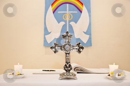 To use this stock image in your creative project, please select the size you need over to the right and click the "Add to Cart" button.
Your downloaded image will come with the Cutcaster watermark removed so don’t worry about the watermark you see on this page. A Christian church pulpit stock photo, A Christian church pulpit with a cross and two candles. The doves of peace is on a sign on the wall. by Nicolaas Traut