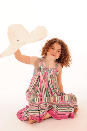 To use this stock image in your creative project, please select the size you need over to the right and click the "Add to Cart" button.
Your downloaded image will come with the Cutcaster watermark removed so don’t worry about the watermark you see on this page. Adorable little girl stock photo, An adorable little girl with very curly hair. by Nicolaas Traut